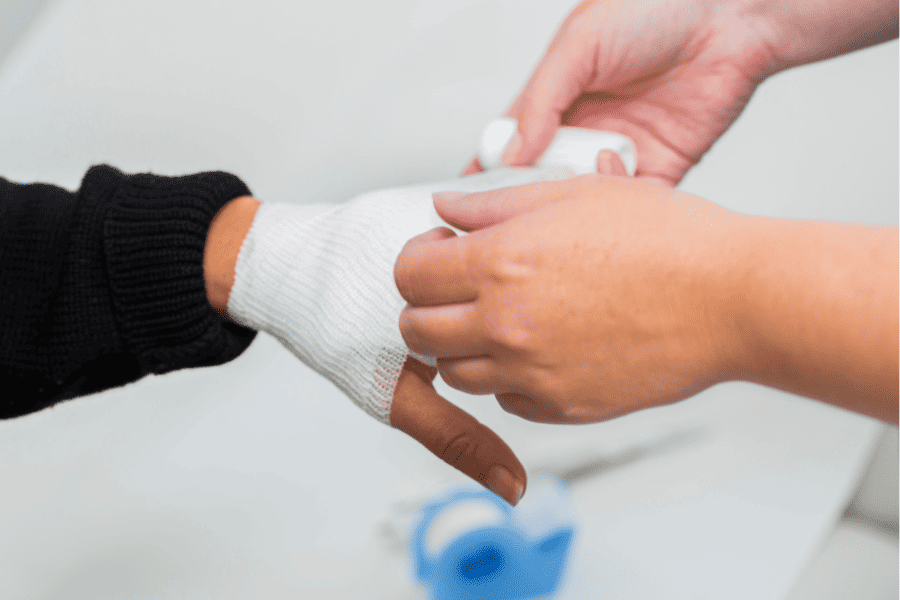 Care taker wrapping post surgical hand wound