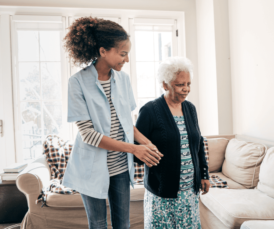 Nurse helping senior diabetic patient with foot ulcer